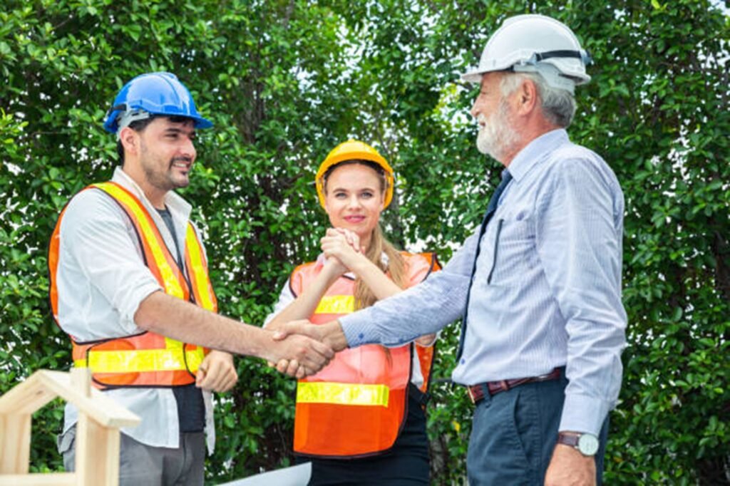 Heartland Tree Service team consulting with a homeowner before a tree trimming project, providing professional guidance and dependable tree care in Hazelwood, MO.